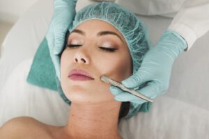 woman receiving facial skincare treatment