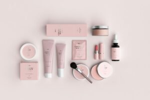 Assorted beauty cosmetics and makeup bottles on a table