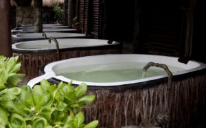 A row of hot tubs sitting next to each other