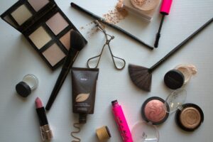 A variety of cosmetics and makeup products on a table