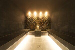 A tranquil indoor spa setting with ambient lighting and restorative atmosphere